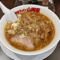 Dark miso ramen noodles with many ingredients such as bean sprouts
