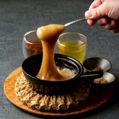 A basic type of raw fire-neaded rice cake, carefully kneaded over a fire.