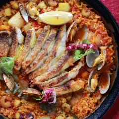 Seafood paella topped with sumptuous Tsuruga sea bream