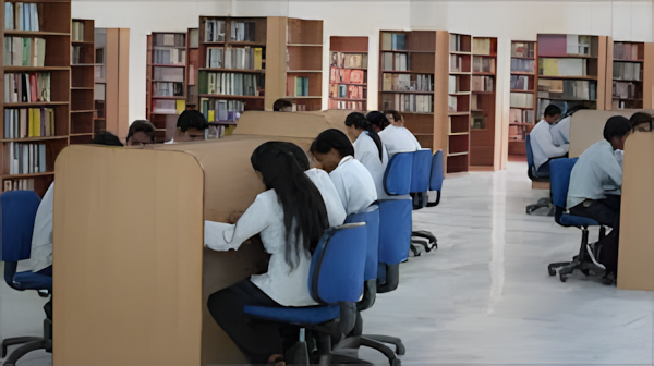 Student writing efficient notes in engineering classroom