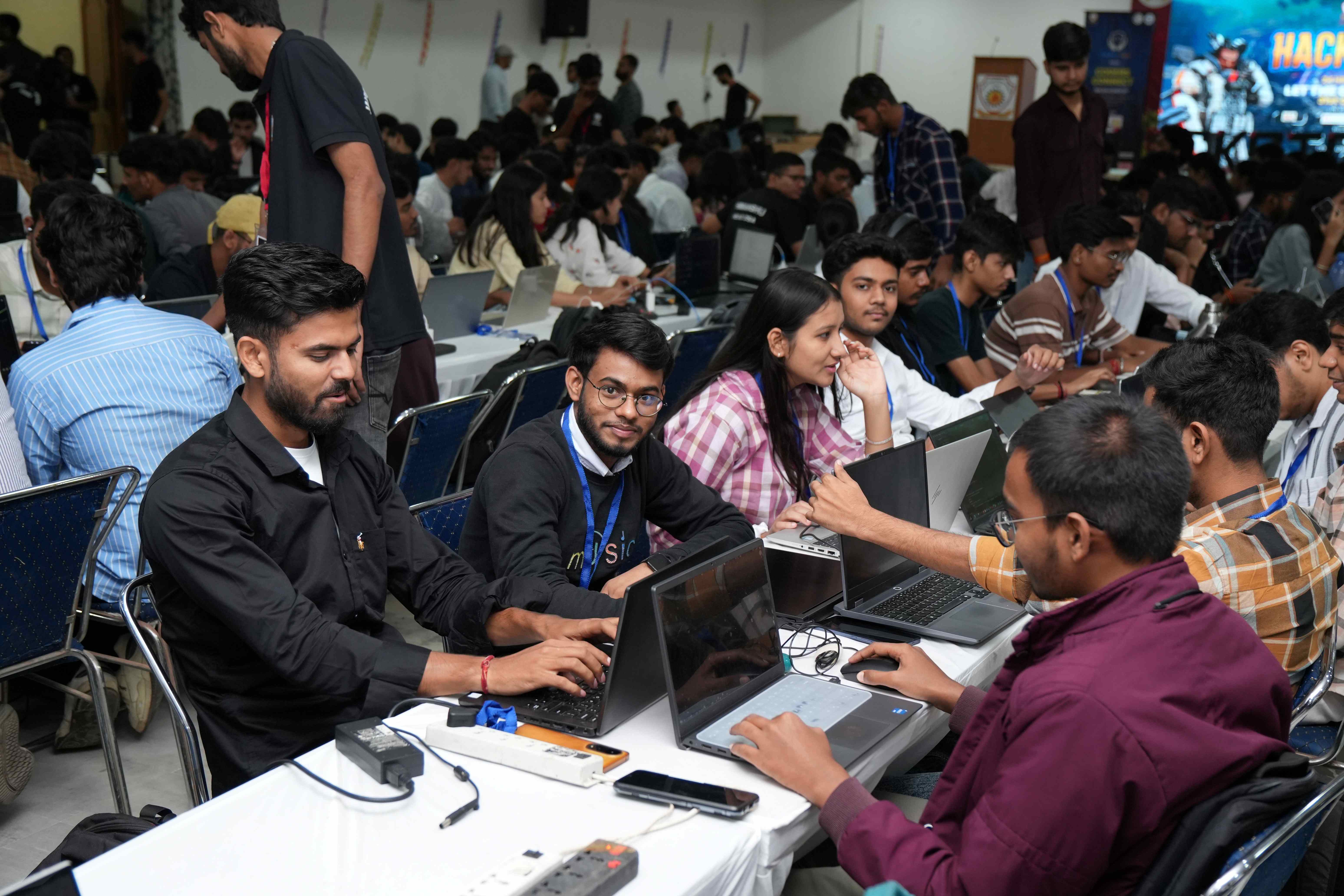 Students studying together in a co-ed engineering college classroom