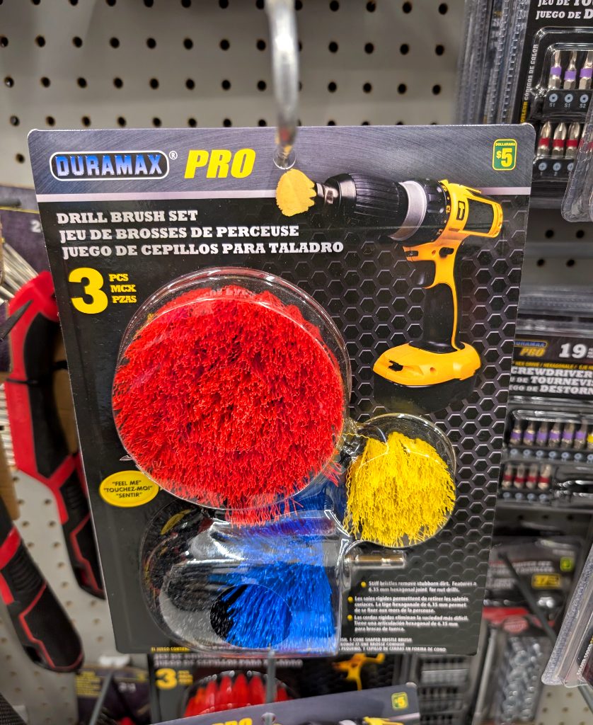 Duramax Pro 3-piece drill brush set from Dollarama, $5, with red, yellow, and blue brushes for versatile cleaning tasks.