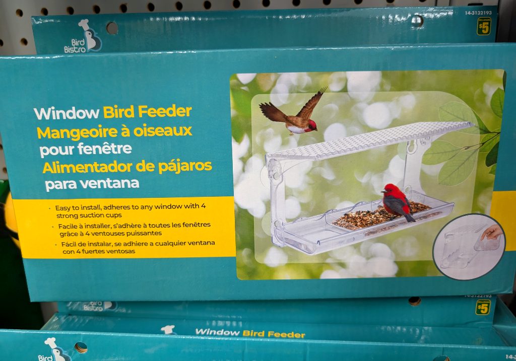 Clear plastic Bird Bistro window bird feeder from Dollarama, $5, attaches with suction cups to attract birds.