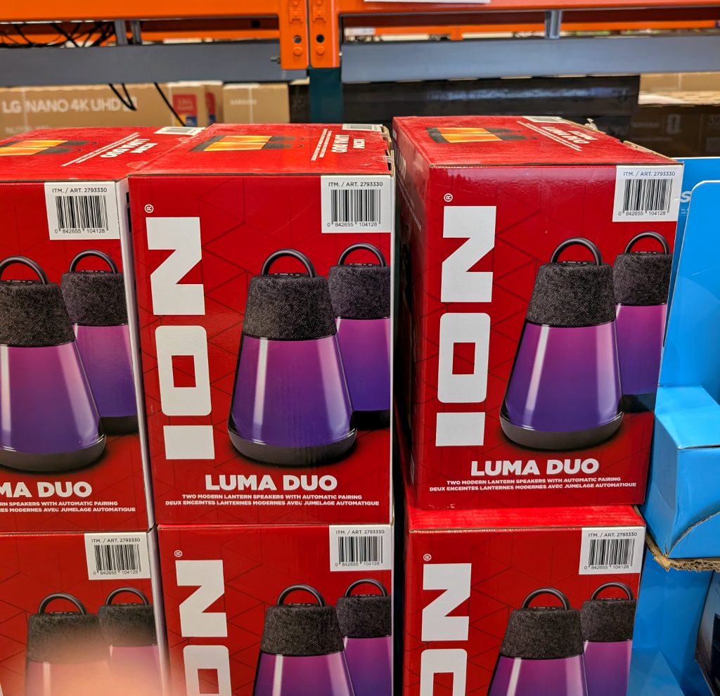 ION Luma Duo 2-pack modern lantern speakers with purple lights and gray fabric tops, ideal for music and ambiance, from Costco for $69.97.