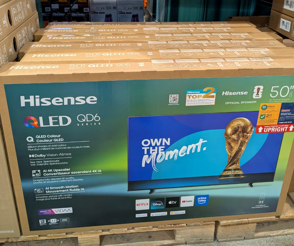 Hisense 50-inch 4K UHD QLED Smart TV box from Costco. Features QLED color, Dolby Vision, and AI upscaling for premium home entertainment.