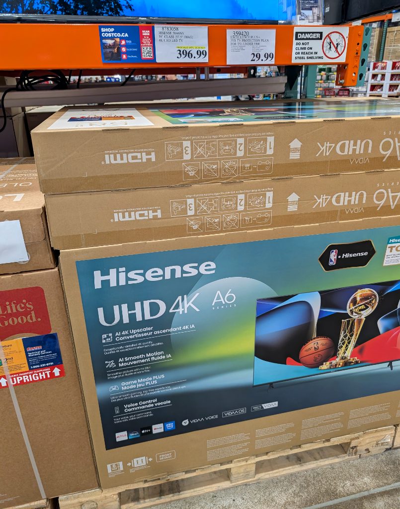 Hisense UHD 4K A6 Series 58-inch LED TV from Costco for $396.99, featuring AI upscaling and voice control.