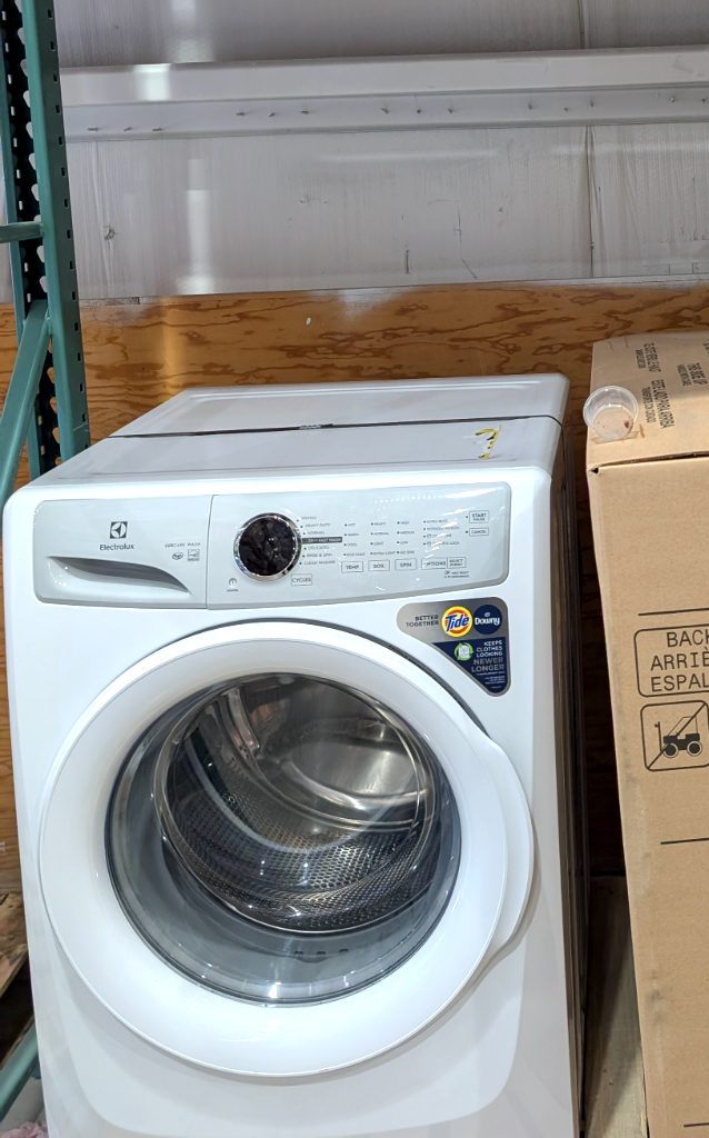 White Electrolux 3 Series 27in front-load washer from Costco, priced at $649.99, offering efficient laundry care.