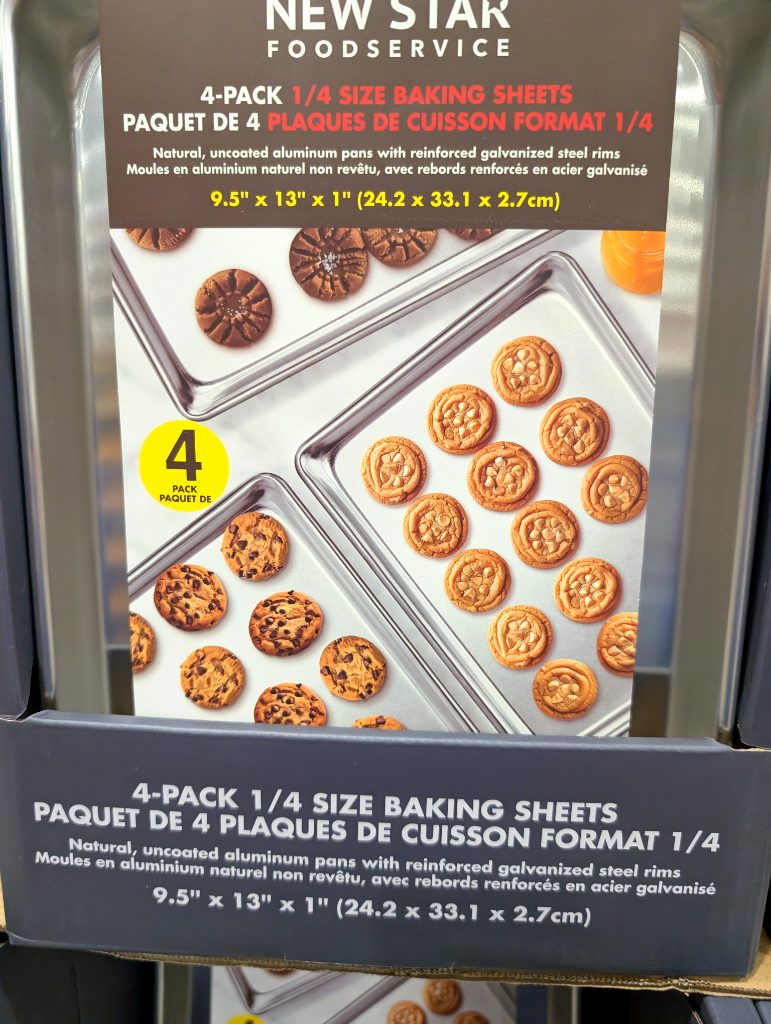 New Star Foodservice 4-pack 1/4 size natural aluminum baking sheets with reinforced steel rims for durable baking.
