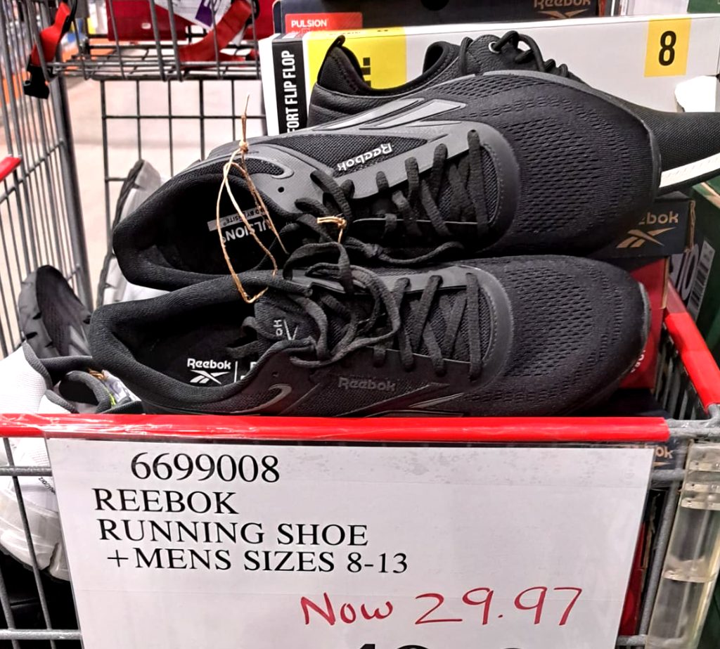 Black Reebok men's running shoes, sizes 8-13, on sale at Costco for $29.97.