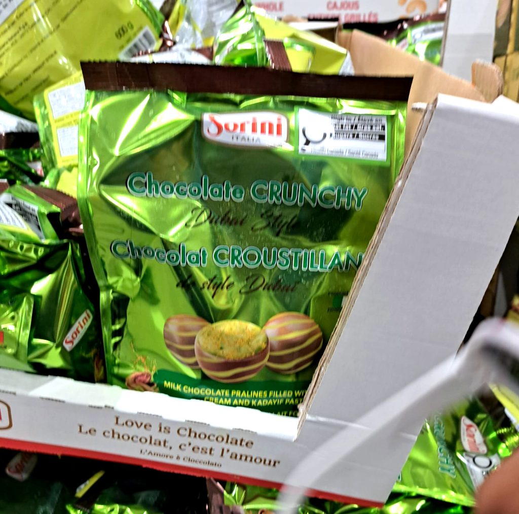 Green bag of Sorini Chocolate Crunchy Dubai Style pralines with creamy and crispy kadayif filling, available at Costco.