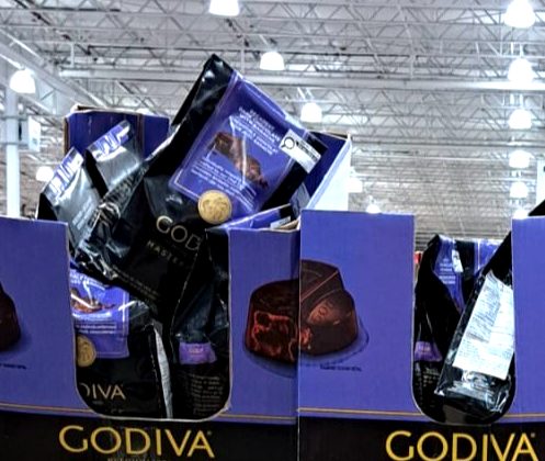 Godiva Masterpiece dark chocolate 428g bag from Costco, on sale for $12.97, ideal for gifts or personal indulgence.