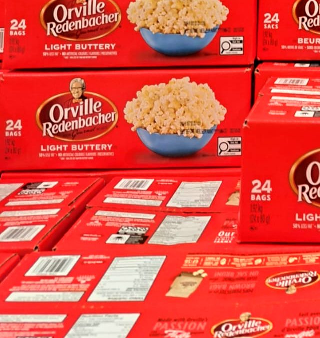 Orville Redenbacher Gourmet Light Buttery Popcorn 24-bag box from Costco, perfect for movie nights or parties.