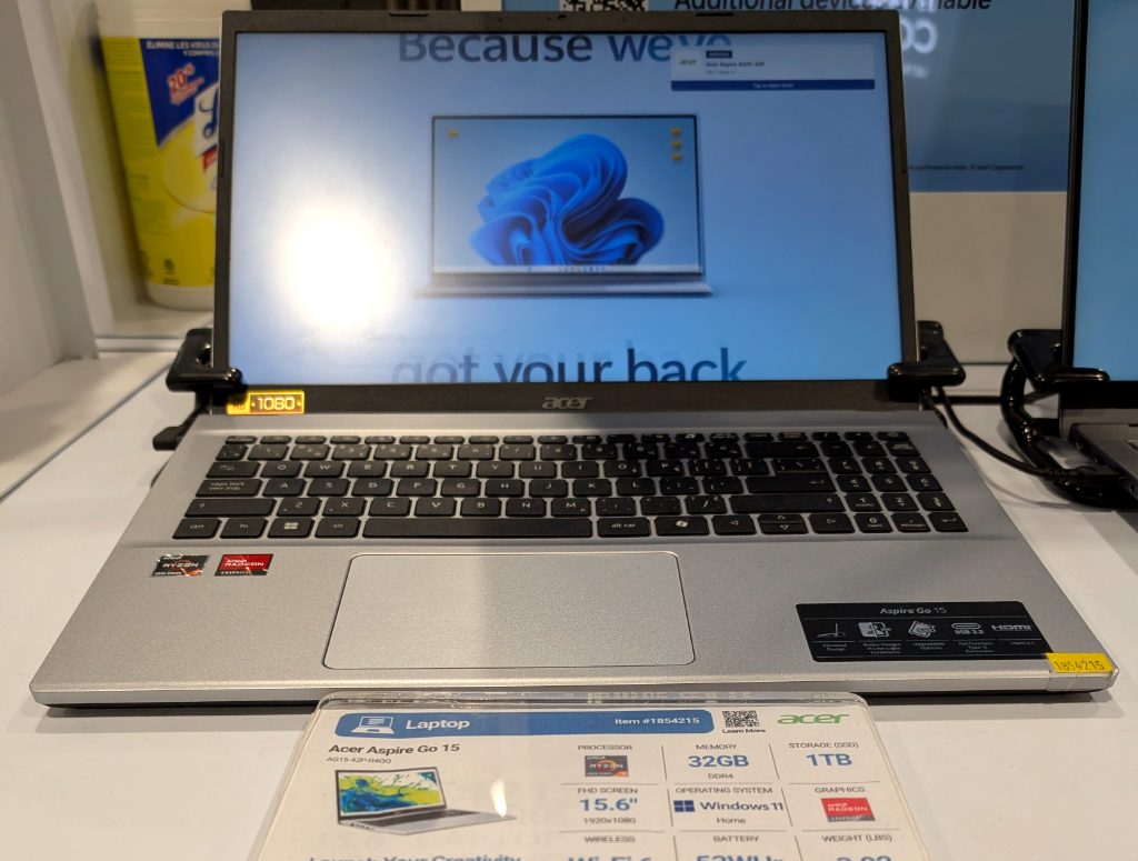 Silver Acer Aspire 15.6 inch laptop with AMD Ryzen 7 processor and 1TB SSD from Costco, priced at $899.99.