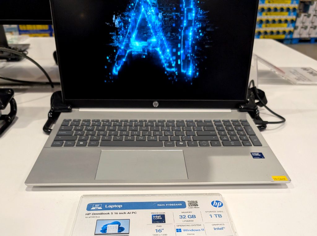Silver HP OmniBook 5 16-inch AI PC laptop with Intel Core Ultra 7 from Costco, priced at $1199.99.