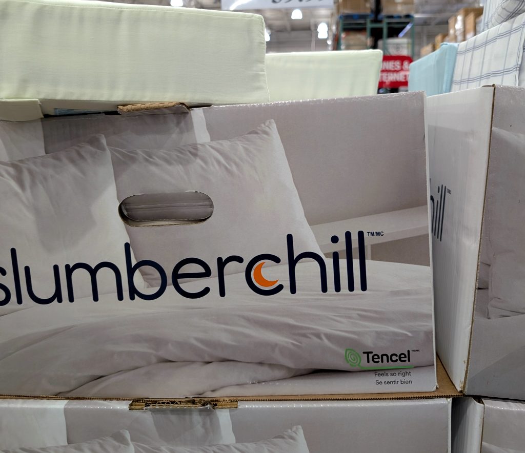 White Slumberchill Tencel cooling queen sheet set from Costco, priced at $39.99, perfect for a comfortable night's sleep.