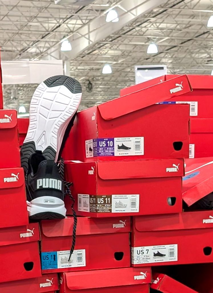 Puma black and white men's running shoe with a thick sole from Costco, on sale for $39.99.