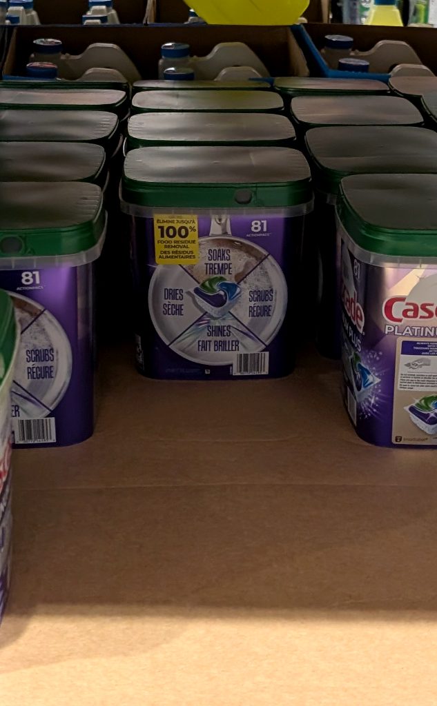 Cascade Platinum Plus dishwasher detergent, 81-count purple tubs with green lids, for sale at Costco for $23.99.