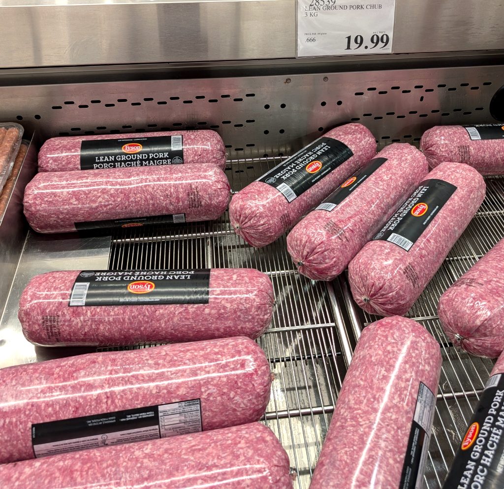 Tyson Lean Ground Pork Chub, 3 kg, sold in bulk at Costco for $14.99 after discount.