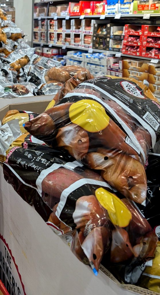 Large bags of Goldenheart potatoes from Canada, available at Costco for $4.99, perfect for various dishes.