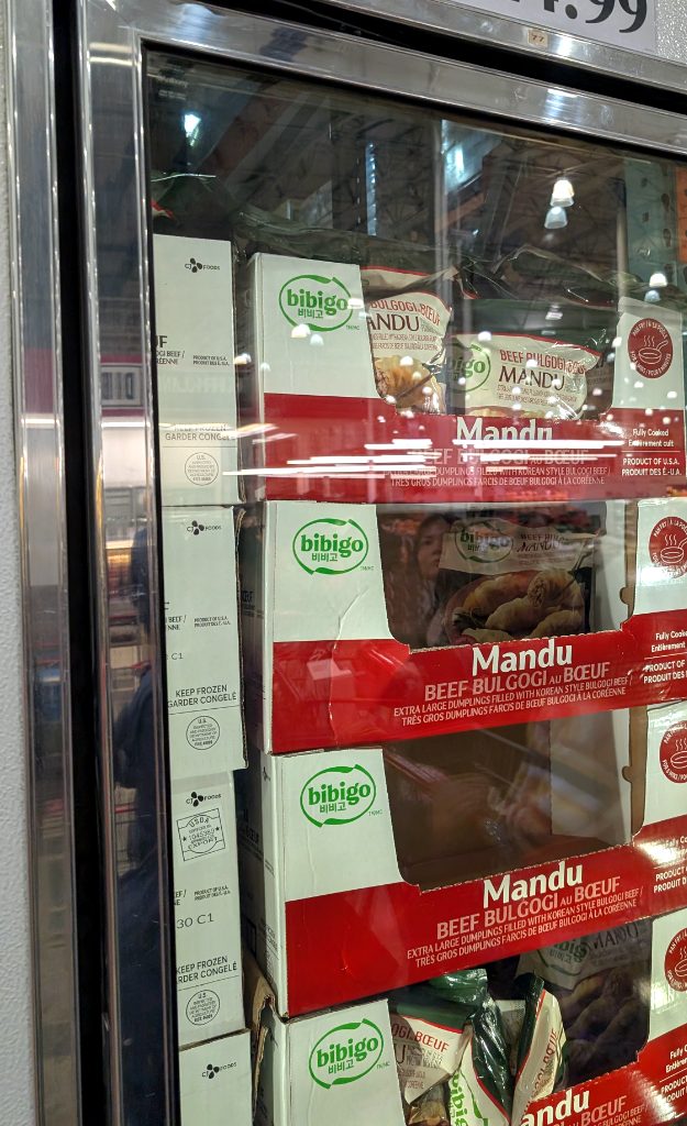 Bibigo Beef Bulgogi Mandu extra large frozen dumplings from Costco for $14.99, perfect for quick and savory meals or appetizers.