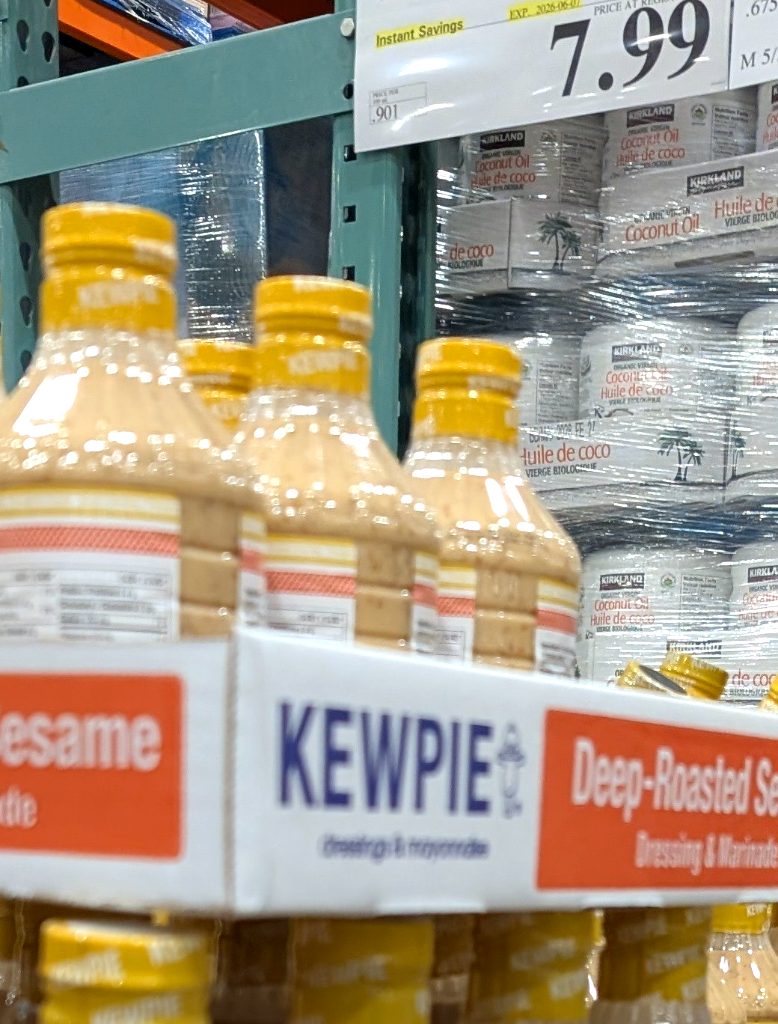 Kewpie Deep-Roasted Sesame Dressing, 887mL, on sale at Costco for $7.99, perfect for salads.