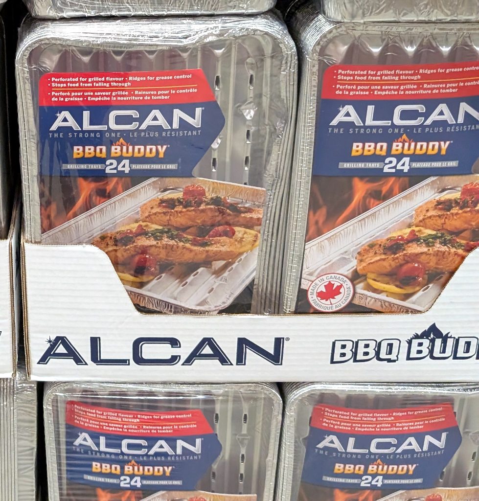 Alcan BBQ Buddy aluminum grill trays (24-pack) from Costco, ideal for outdoor grilling. Priced at $7.99 for cooking convenience.