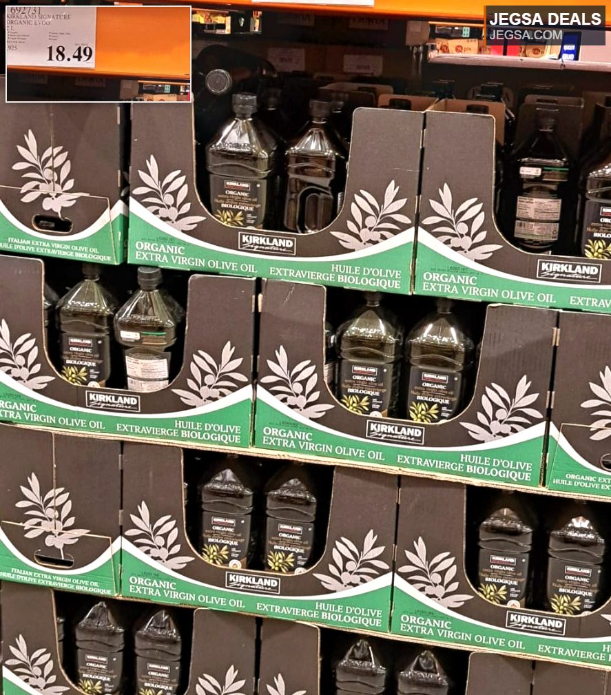Kirkland Signature Organic Extra Virgin Olive Oil from Costco, 2L bottles in dark green, ideal for cooking and salad dressings.
