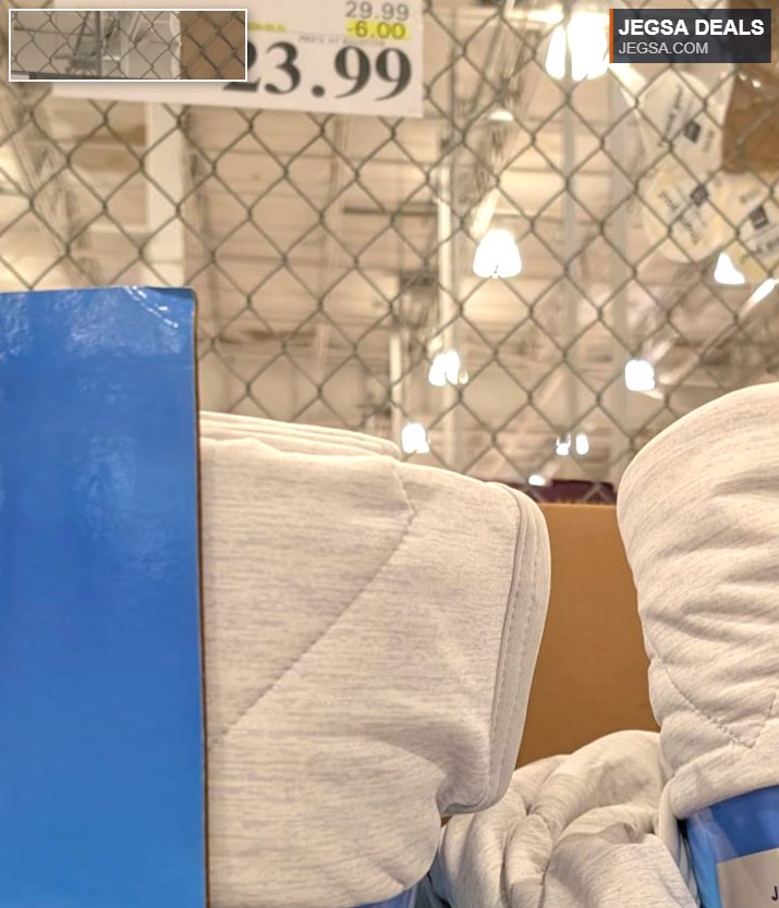 Light grey quilted Below Zero Cooling Throw from Costco, 60x70 inches, priced at $23.99 for enhanced comfort.