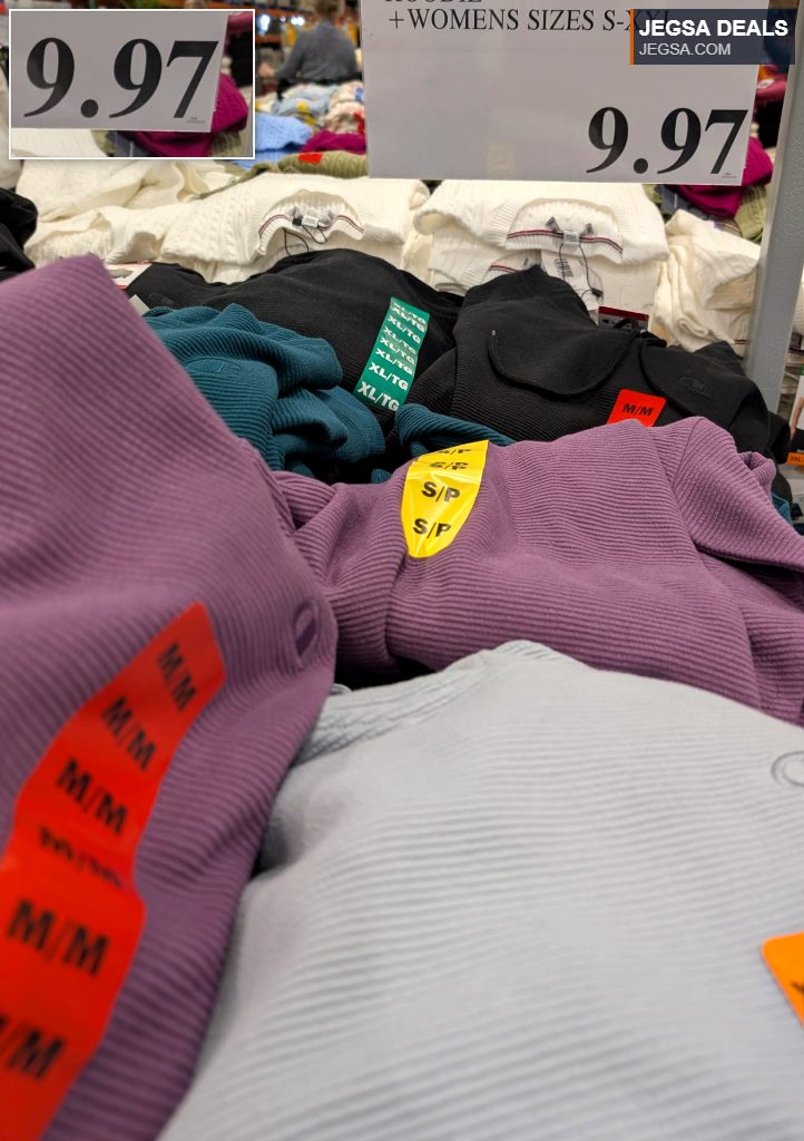 Purple ribbed Champion hoodie in various sizes for $9.97, displayed in bulk at Costco.