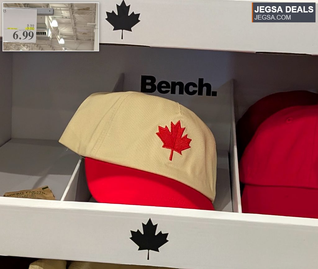 Red and beige Canada hats with maple leaf or flag designs, one-size, available at Costco for $6.99.