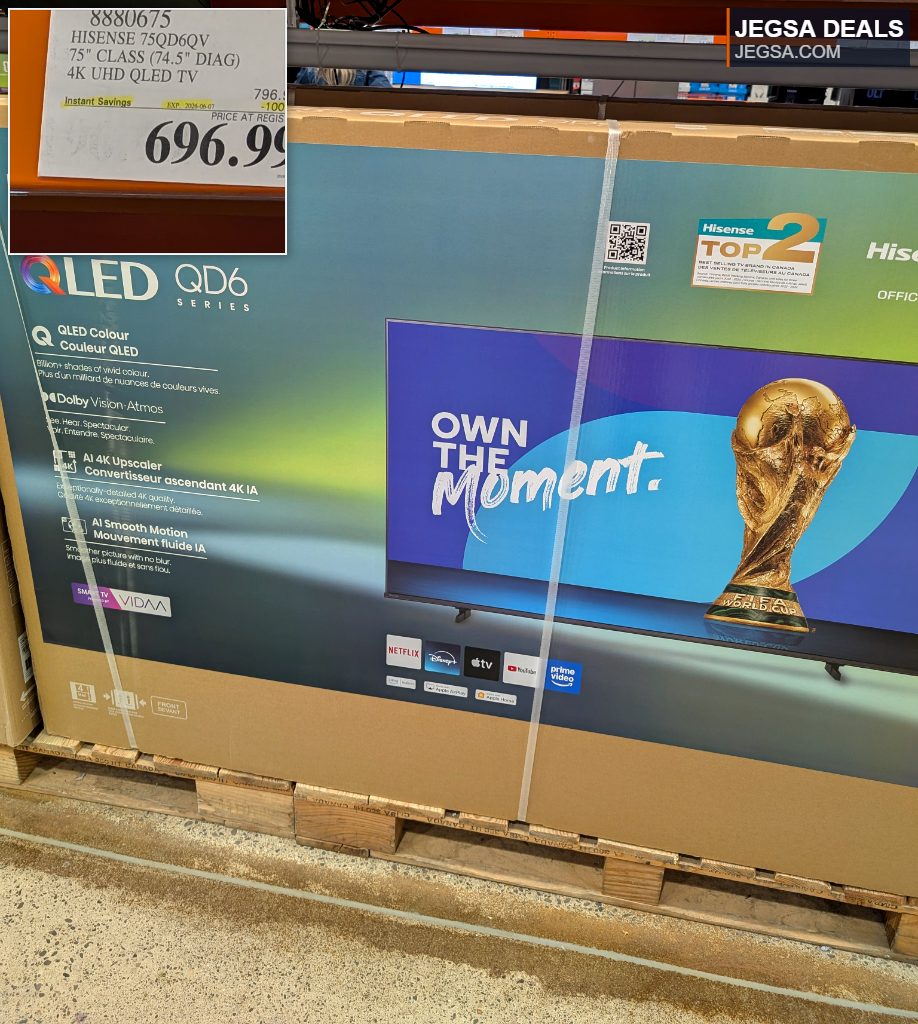 Hisense 75-inch QLED QD6 Series 4K UHD TV in a cardboard box from Costco, perfect for a premium home theater experience.