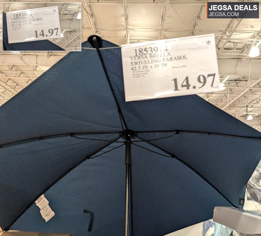 Navy Versa Brella swiveling parasol, 42.5in x 46in, for outdoor sun protection, displayed at Costco for $14.97.