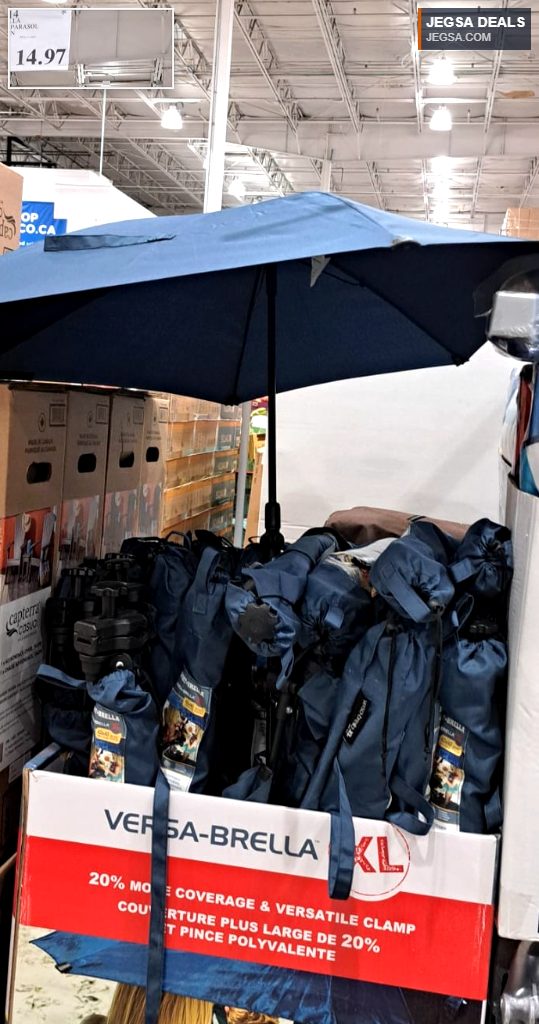 Navy blue Versa-Brella XL swiveling clamp-on parasol from Costco, ideal for sun protection during outdoor activities.