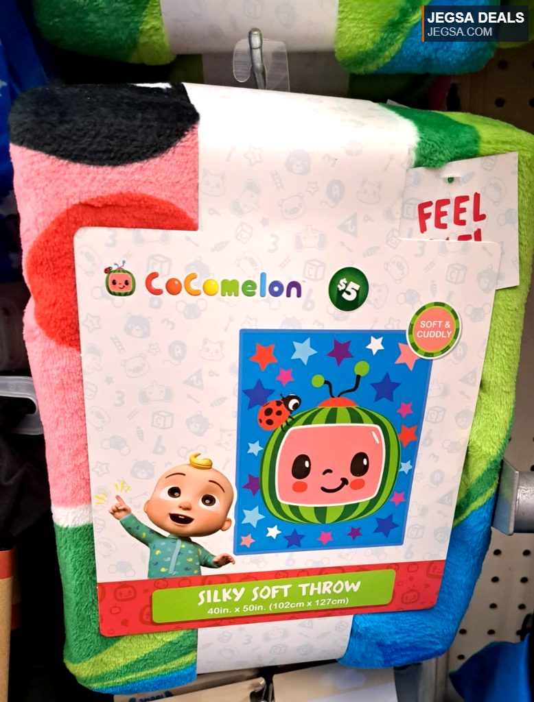 CoComelon silky soft throw blanket in pink, green, and blue, perfect for kids. A soft and cuddly addition from Dollarama, priced at $5.