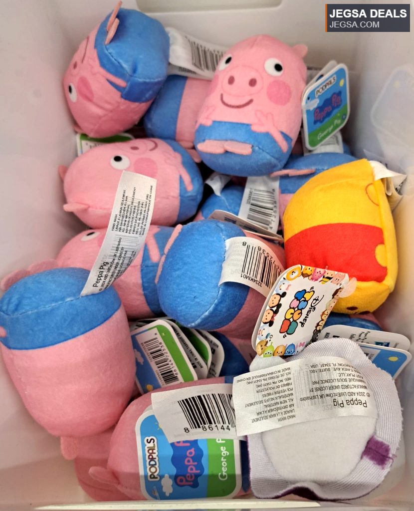 Pink and blue plush Peppa Pig and George Pig Podpals from a value store, soft toy collection.
