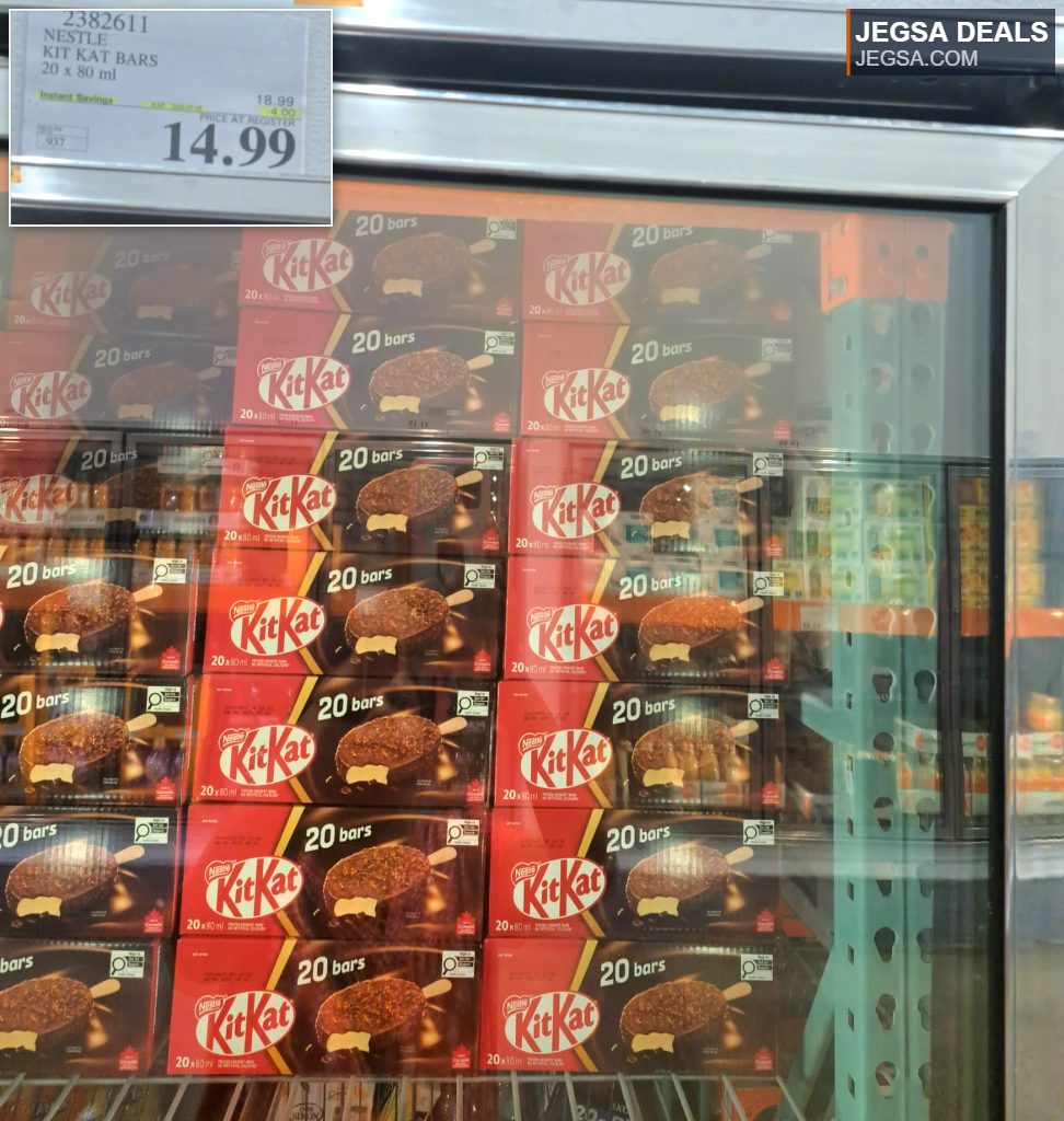 Nestle Kit Kat Bars, a box of 20 frozen chocolate-covered ice cream bars, displayed in a freezer at Costco for $14.99.