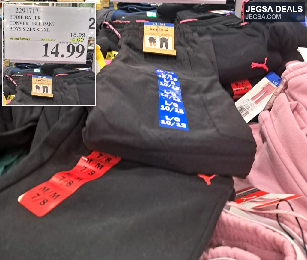 Eddie Bauer Boys' convertible pants in black, available in sizes S-XXL, on display at Costco for $14.99.