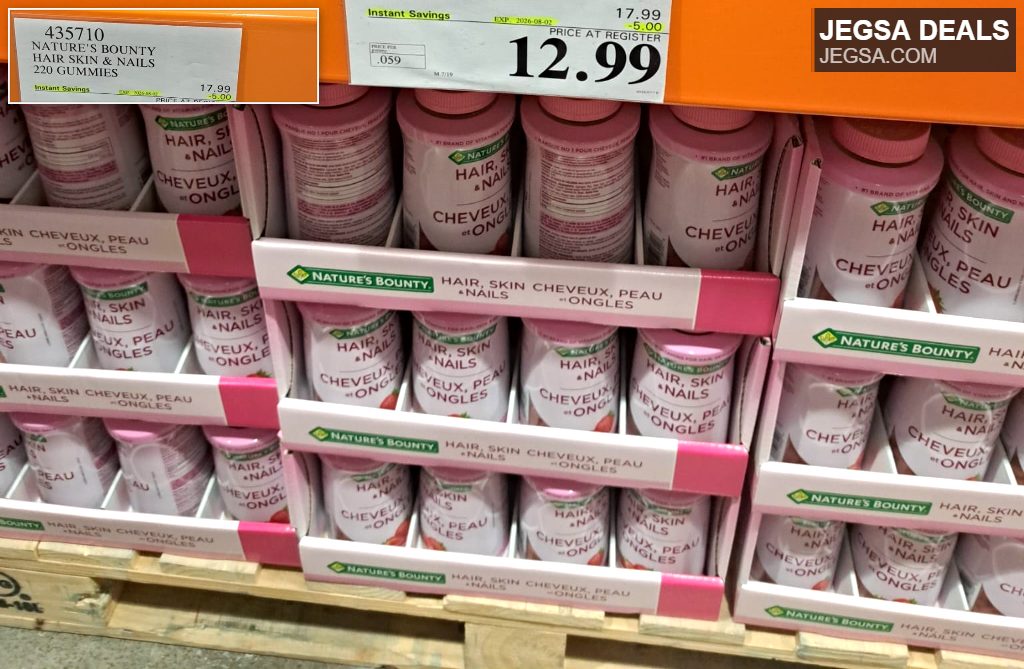 Nature's Bounty Hair, Skin & Nails 220 Gummies in pink bottles on a display shelf at Costco for $12.99.