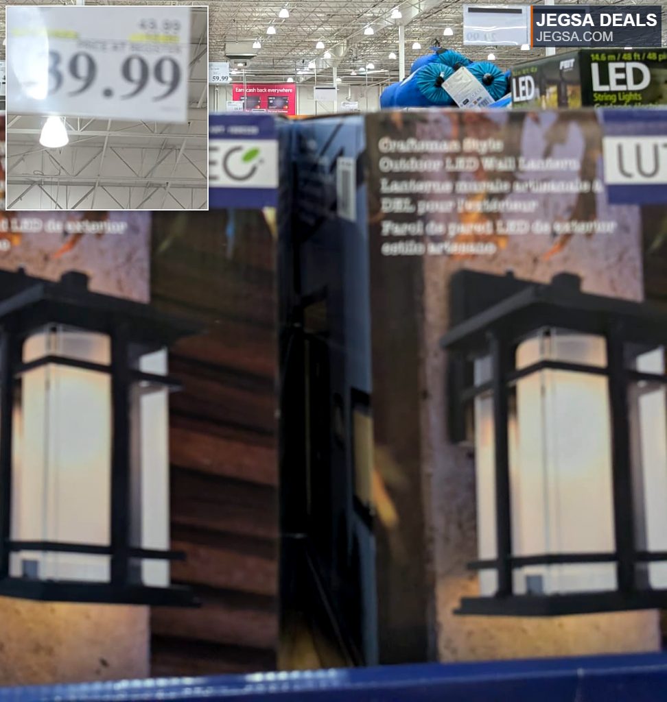 Lutec Craftsman style black outdoor LED wall lantern from Costco, perfect for illuminating home exteriors, priced at $39.99.