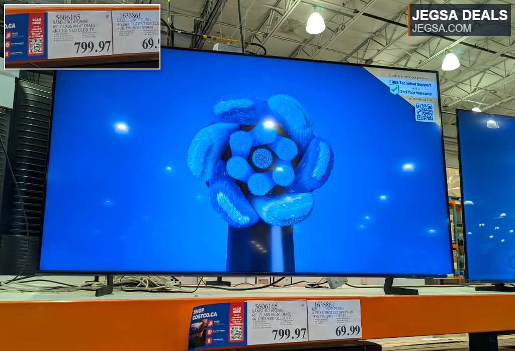 Samsung 65-inch 4K UHD Neo QLED TV on display at Costco, featuring a bright blue screen with a dynamic abstract image.