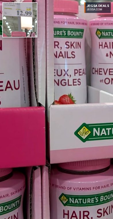 Nature's Bounty Hair Skin & Nails 220 strawberry gummies for beauty support, seen on a shelf at Costco for $12.99.