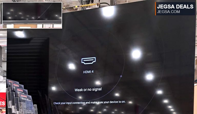Large black Hisense 65-inch 4K UHD Mini-LED QLED TV on display at Costco for $746.99, showing HDMI 4 weak signal.