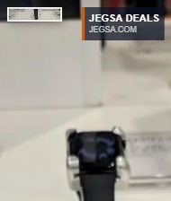 Apple Watch Series 11 GPS 46mm in Jet Black, M/L size, on display at Costco, offering advanced fitness and health tracking.