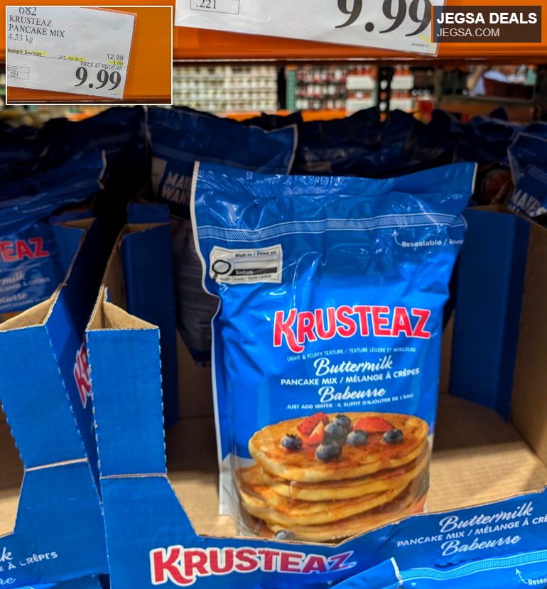 Large 4.53 kg blue bag of Krusteaz Buttermilk Pancake Mix, shown with pancakes, available at Costco for $9.99.