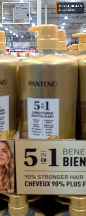 Large golden Pantene 5 in 1 Conditioner bottle, 1.13 L, for stronger hair, found at Costco for $9.99.