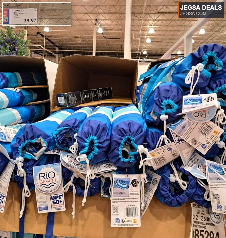 Blue and white striped Rio Beach Umbrella, 7.5 ft, with UPF 50+ protection, available at Costco for $29.97.