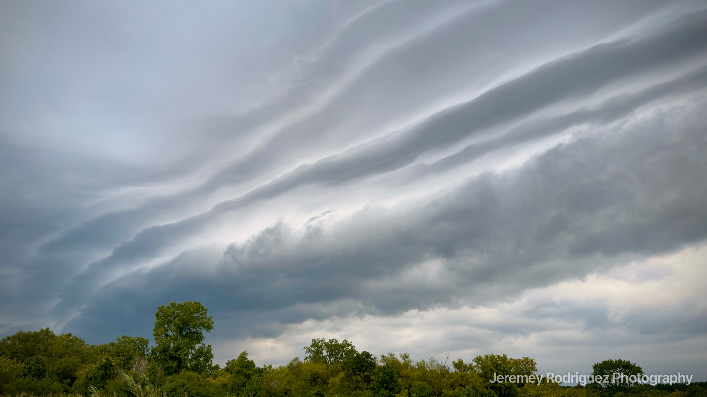 Wisconsin Layered Shelf Cloud Sweeping Over Treetops