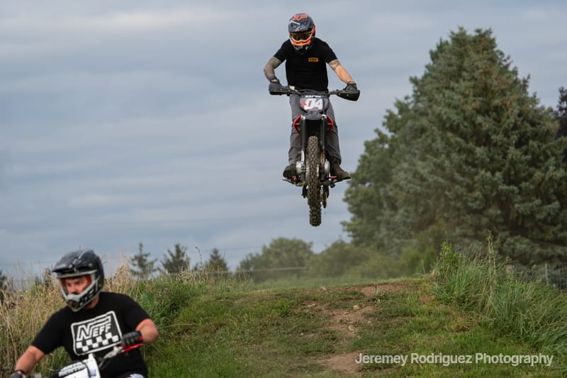 Dirt Bike Jump Over a Waiting Rider