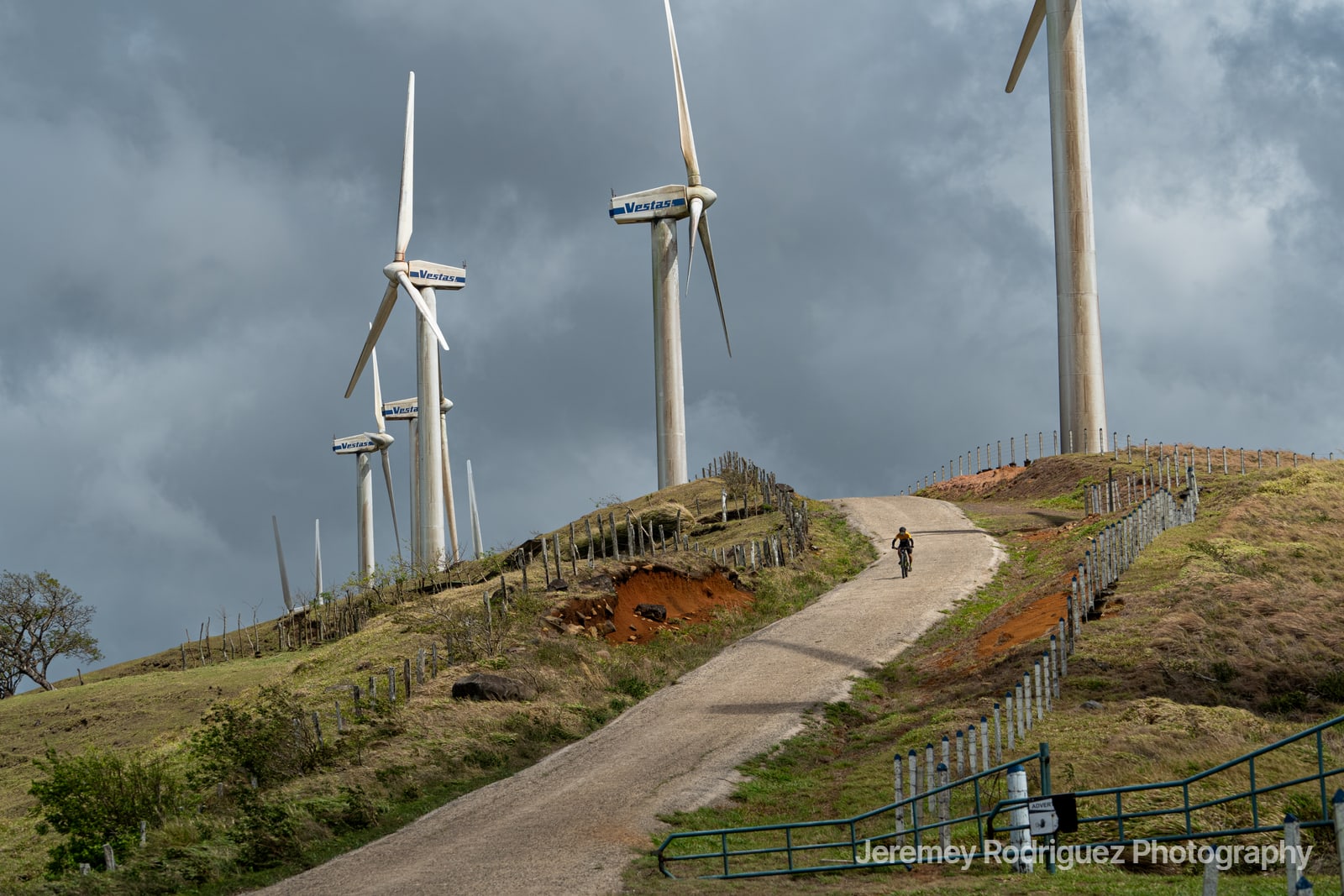 Gravel Road Through Wind Turbine Hills