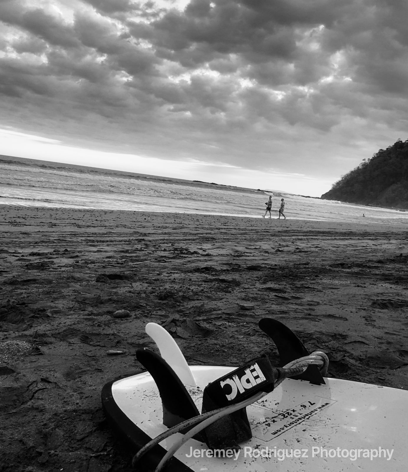 Surfboard Fins on a Moody Black-and-White Beach